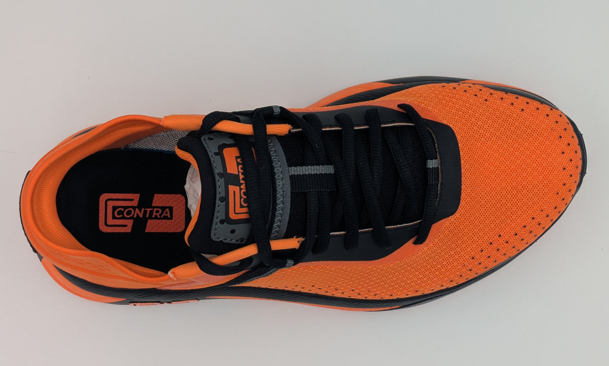Orange and black athletic shoe with 'Contra' branding on a light gray background